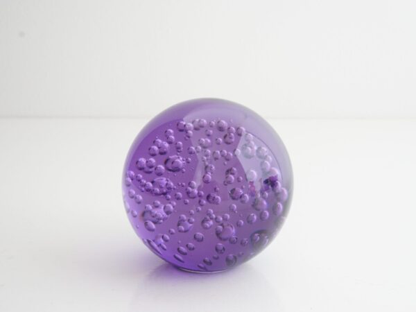 Purple glass sphere paperweight