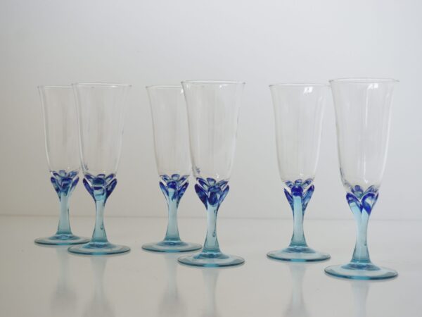 Champagne flutes with Murano detailed glass ornaments